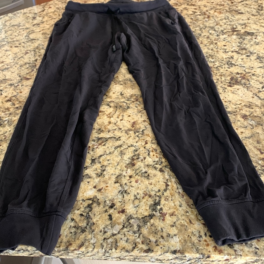 Size 8 Black Lululemon joggers in used fair condition